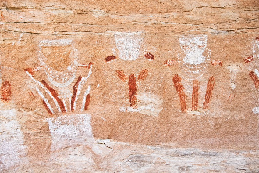 Close-up of three of the Thirteen Faces